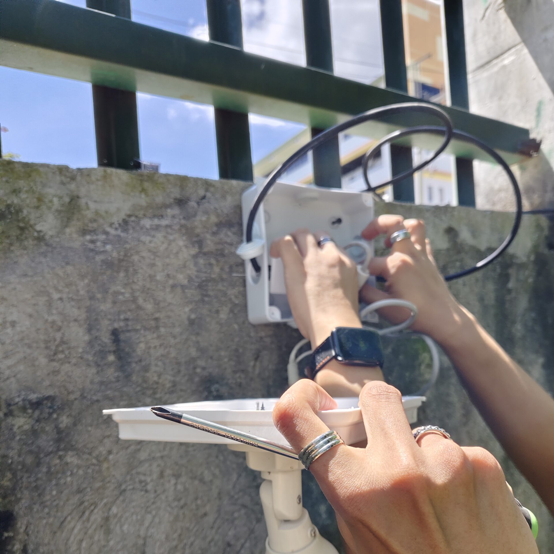 Adjusting camera angle precisely.